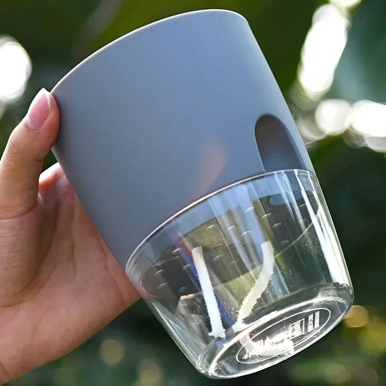 Self-watering plant pot with clear reservoir – features