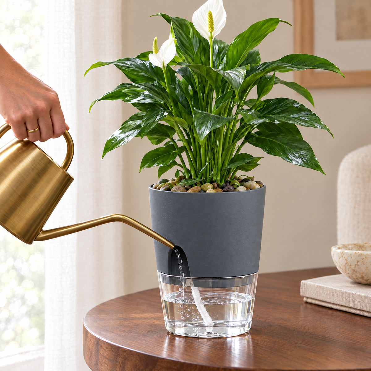 Watering can filling the self-watering pot through its side fill port