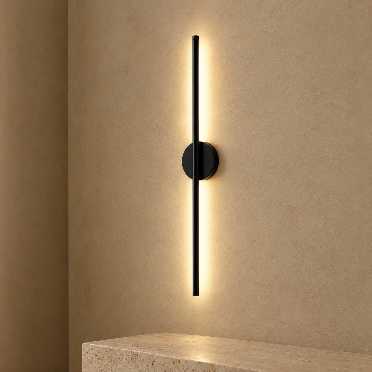 Black magnetic wall light on a sand plaster wall