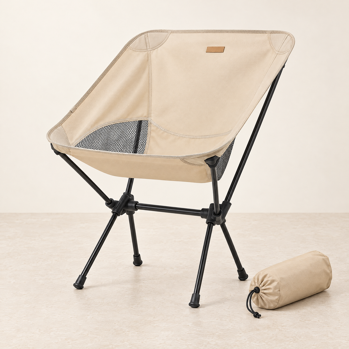 Beige camping chair with its compact carry bag
