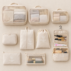 Cream packing cube set laid out flat
