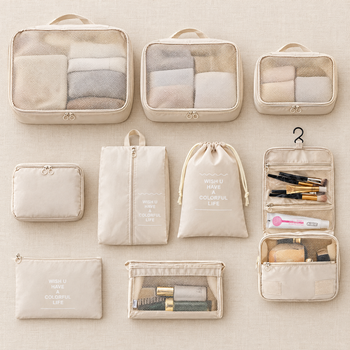 Cream packing cube set laid out flat